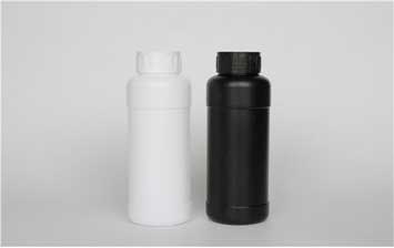 Extra-thick colored fluorinated acid and alkali resistant plastic detergent bottles