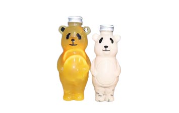 Bulk sale 700ml cartoon PET panada shape creative juice bottles with caps for juice/milk tea