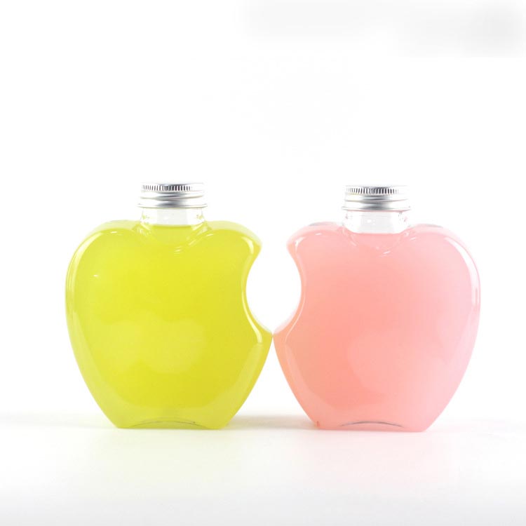 Custom clear 12oz apple shaped plastic juice bottles with caps from supplier