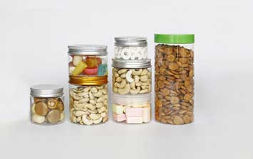 Round clear plastic storage jars with screw lids for kitchen