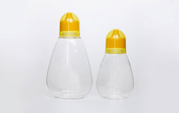 China supplier plastic honey containers with lids for sale,plastic honey squeeze bottles