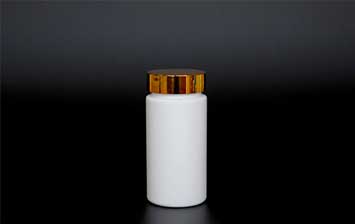Clear plastic cylinder tablet pill bottles with gold caps from pharmaceutical bottle manufacturers
