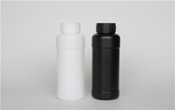 Extra-thick colored fluorinated acid and alkali resistant plastic detergent bottles