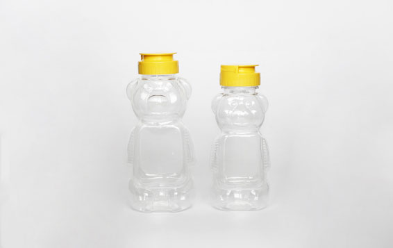 Custom 8oz Cartoon PET Refillable Plastic bear Honey Bottles with Lids