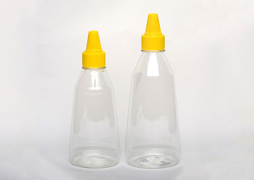 China supplier plastic honey containers with lids for sale,plastic honey squeeze bottles