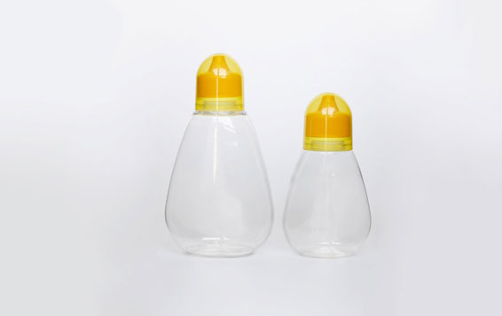 China supplier plastic honey containers with lids for sale,plastic honey squeeze bottles